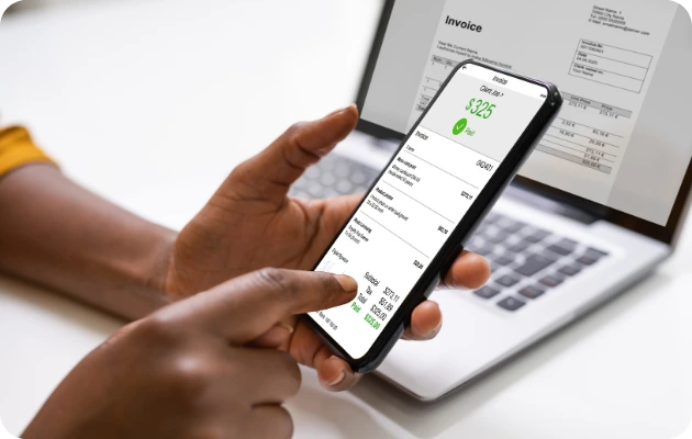 Invincible E-Wallet, woman is paying invoice with the Invincible E-Wallet