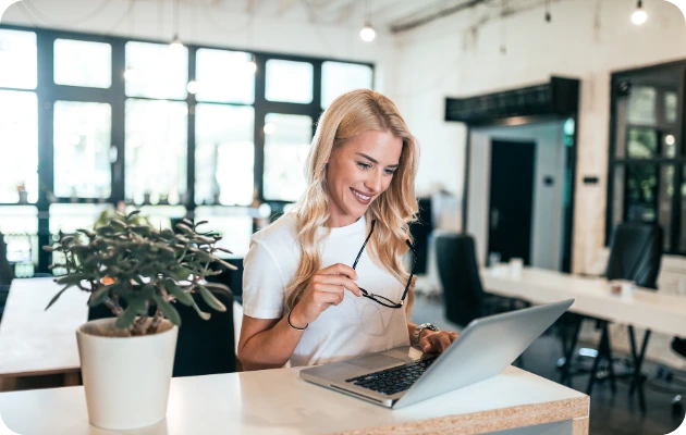 Invincible E-Transfer, woman happy because she has access to the Invincible Pay E-Transfers which have no daily limits unlike her bank. 