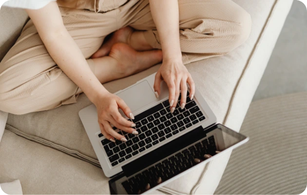 Invincible Pay Bill Payment, Hands typing on keyboard, overhead view